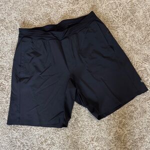 Men’s Lululemon black athletic shorts.
